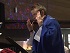 Rev Ruth Jensen-Forbell Directing the Christmas Cantata at Cornerstone MCC